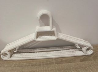 Lote 6 perchas blancas de plástico