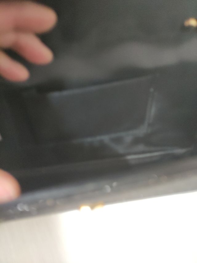 Bolso de fiesta negro con cadena dorada