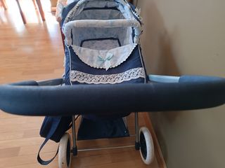 Carrito de muñecas azul con capota
