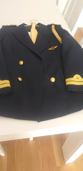 Traje de comunión azul y dorado