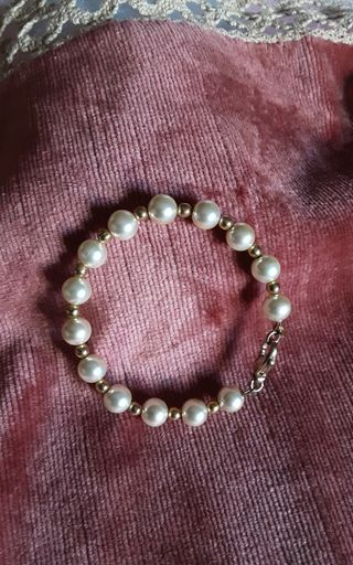 Bracciale perle dorate
