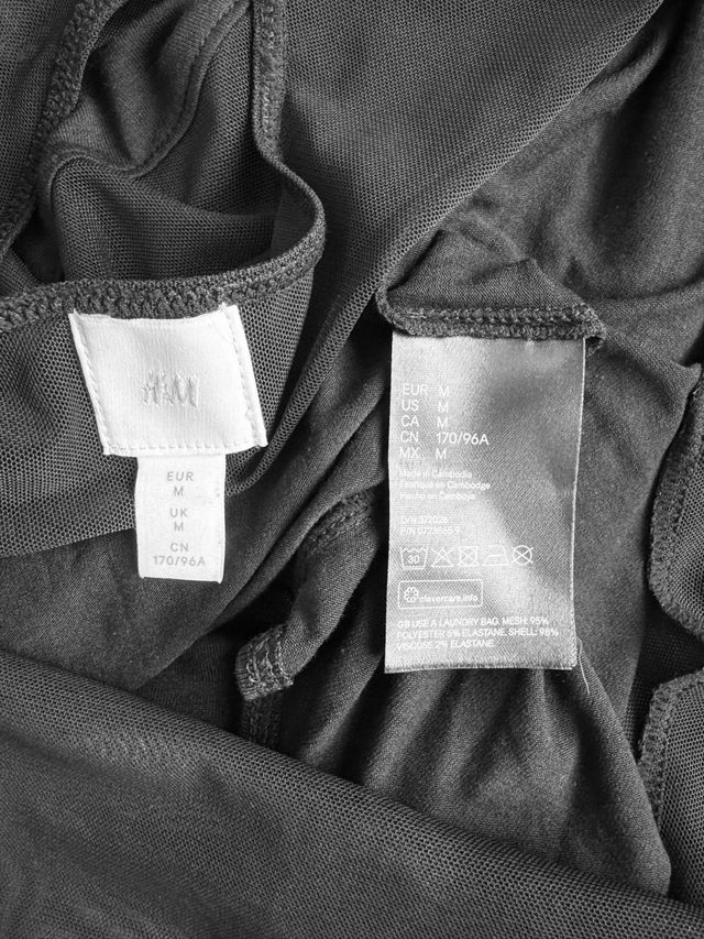 Body negro manga larga con transparencias