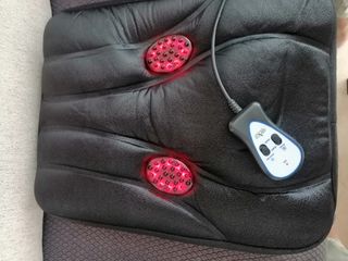 Cuscino massaggiante in pelle sintetica nera