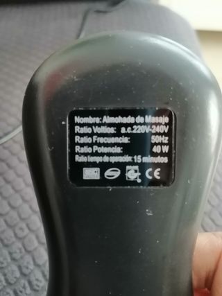 Cuscino massaggiante in pelle sintetica nera
