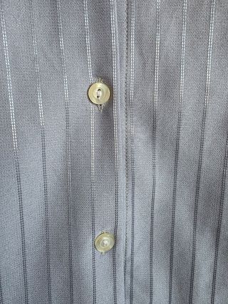Blusa azul manga larga detalle corbata