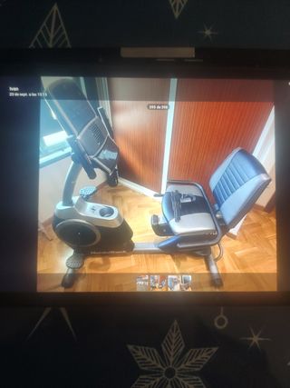 Bicicleta estática con respaldo