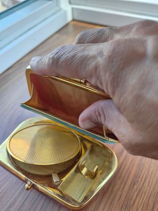 Bolso de mano pequeño, dorado y rojo