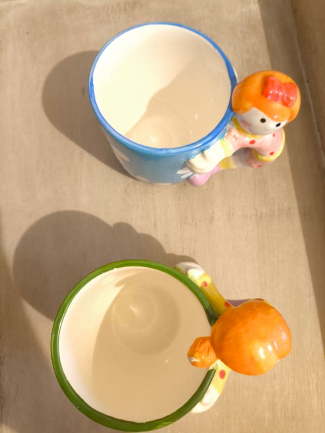 Coppia tazze ceramica con bambina