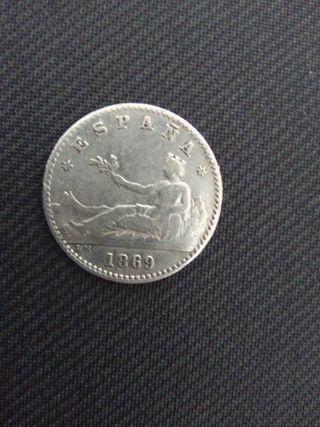 Moneda Antigua 1869 estreyas visibles
