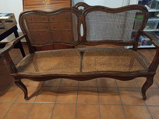 Divano antico in legno e rattan