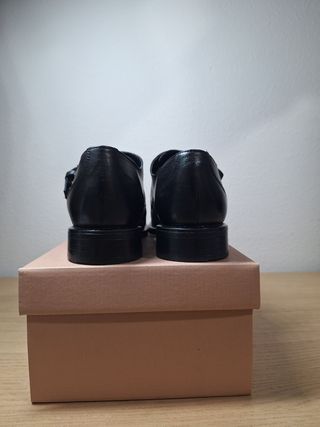 Zapatos de piel negros con doble hebilla