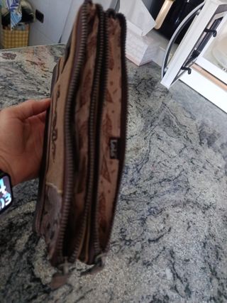 Cartera de mano para móvil y dinero