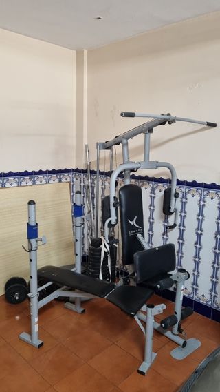 Gimnasio multifunción y saco boxeo