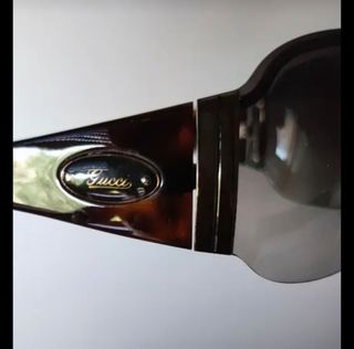 Occhiali da sole donna marroni.