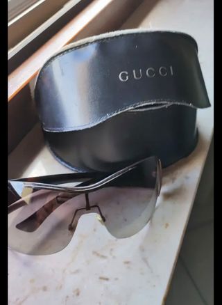 Occhiali da sole donna marroni.