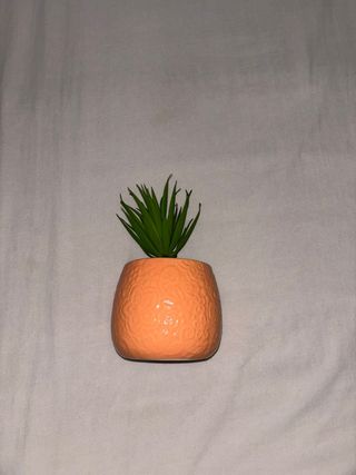 Planta artificial decorativa naranja