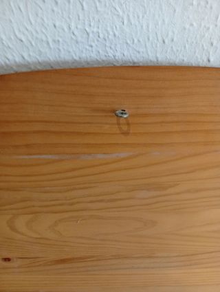 Cabecero de madera marrón