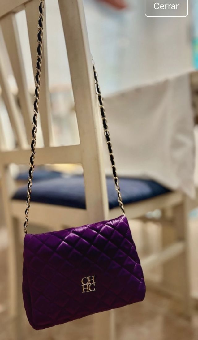 Bolso Carolina Herrera morado acolchado CH