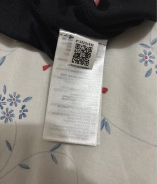 Chaqueta deportiva Adidas negra y gris