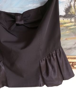 Top nero elegante con fiocco