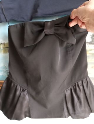 Top nero elegante con fiocco