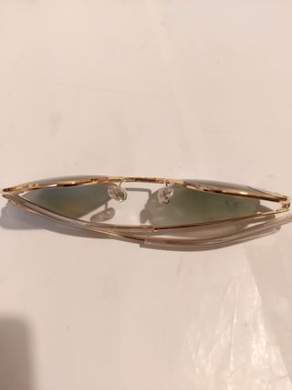 Gafas de sol tipo aviador doradas y verdes