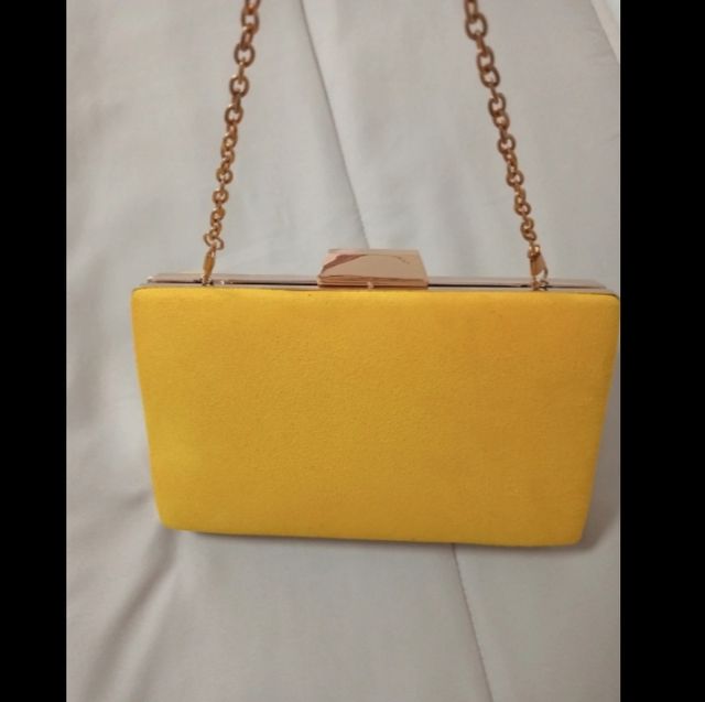 Bolso de fiesta amarillo y dorado