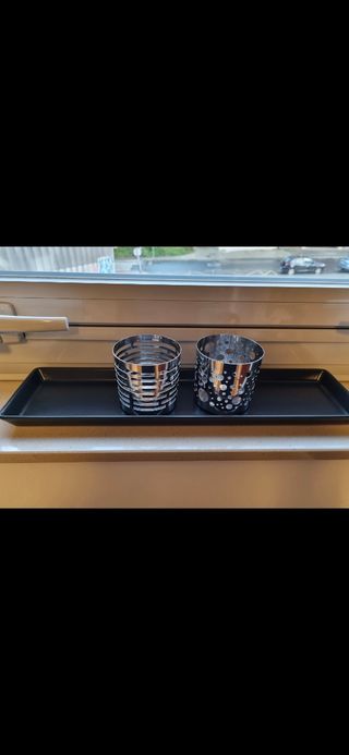 Portavelas de metal plateado