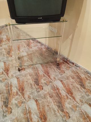 Mueble TV cristal y acrílico dorado