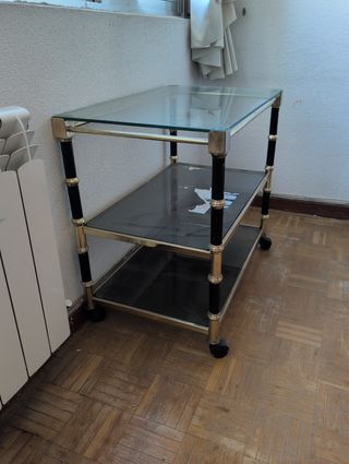 URGE! Mesa auxiliar cristal y metal con ruedas