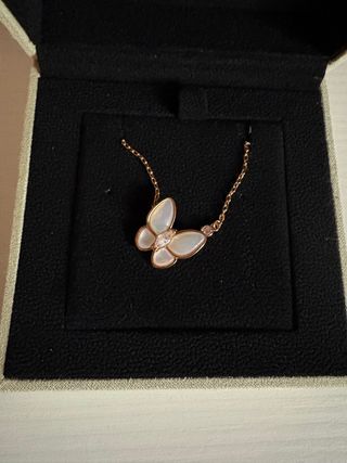 Collana farfalla madreperla dorata in acciaio