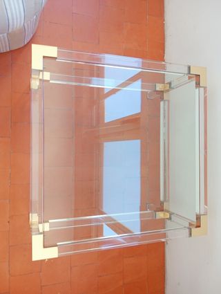 Mesa de centro cristal y metal dorado