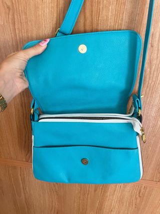 Bolso bandolera turquesa con logo árbol