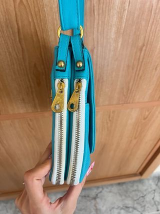 Bolso bandolera turquesa con logo árbol