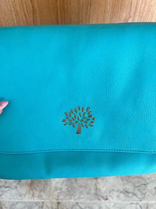 Bolso bandolera turquesa con logo árbol