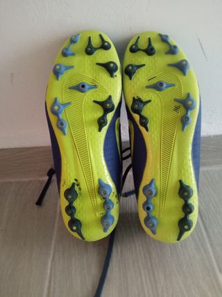 Zapatos de fútbol Nike Mercurial azules y amarillo