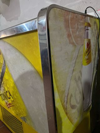 Botellero Schweppes casi nuevo