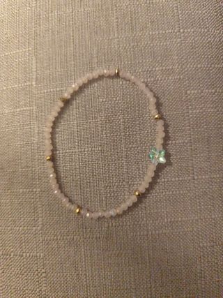 Pulsera de cuentas rosa y dorada