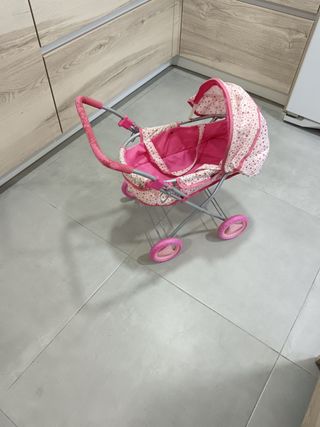 Carrito de muñecas rosa