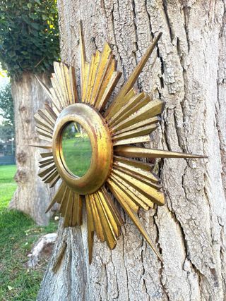 ESPEJO SOL MADERA DORADA.