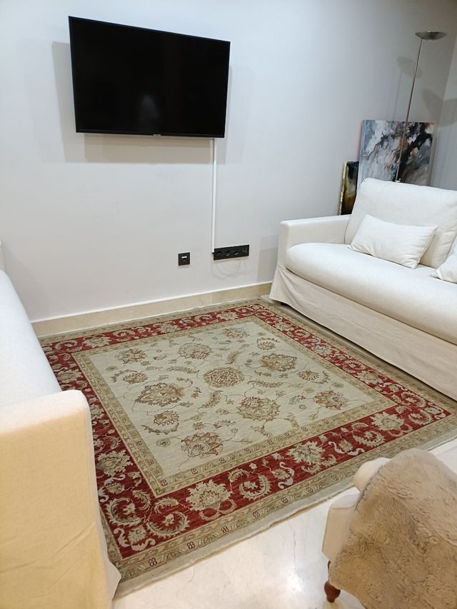 Alfombra de lana beige y roja