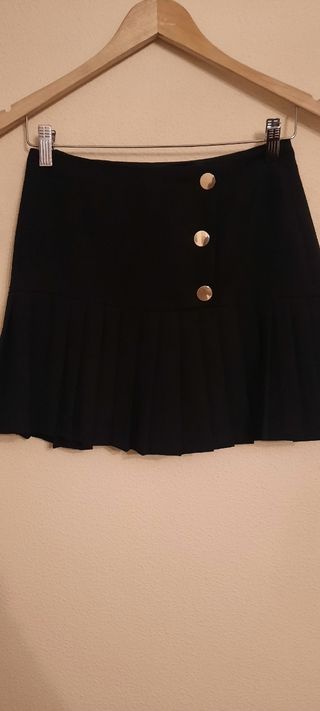 Lote 2 minifaldas: azul flores y negra