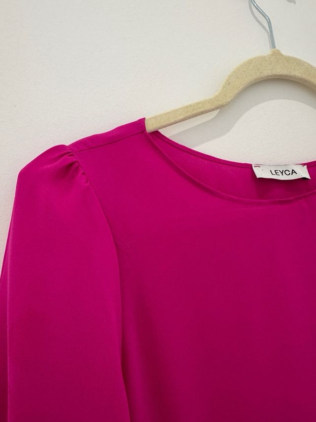 Mono fiesta capa fucsia