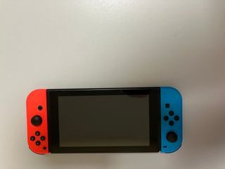 Nintendo Switch roja y amarill