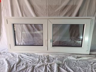 Ventana PVC Doble Hoja Oscilobatiente.