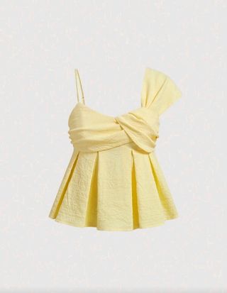 Blusa amarilla con nudo y volantes