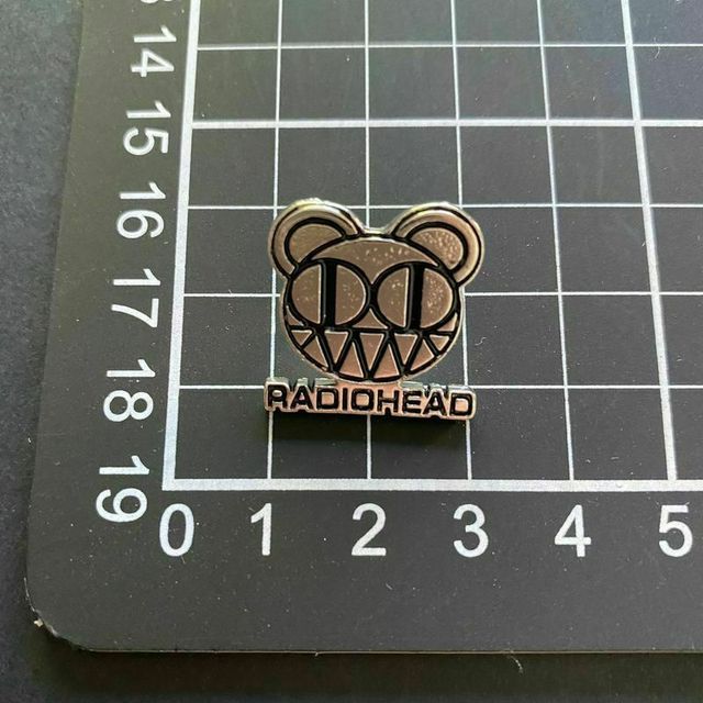 PIN RADIOHEAD NUEVO Y SIN USO, METALICO