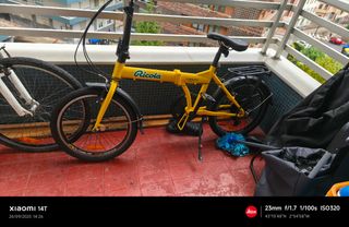 Bicicleta plegable amarilla Ricola