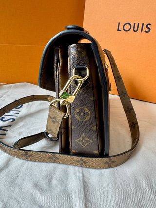 Pochette Metis Louis Vuitton con  factura