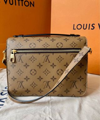 Pochette Metis Louis Vuitton con  factura